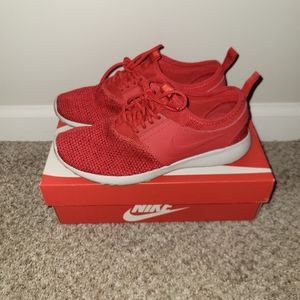 Womens red Nike running shoe 7.5